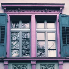 building with closed window related to Elevate Your Windows with Chic White Tab Top Valance