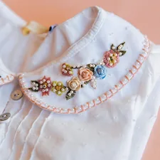 camisa infantil com bordado de flores
_
children's shirt with flower embroidery related to The Chic Touch: Lombardi Smocked Coverlet Decorating Ideas