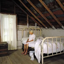 Carol Highsmith’s Aunt Kate on her 90th birthday in the log cabin where her Grandfather and Great Grandfather were born related to Inflating Comfort: A Comprehensive Guide to Bed Bath and Beyond Air Mattresses