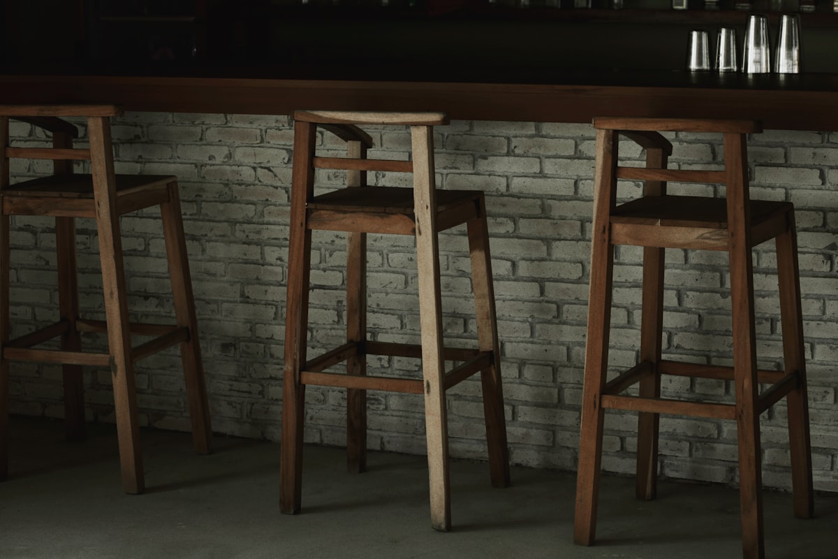 chair story related to Elevate Your Home Bar with a White Sideboard with Wine Rack