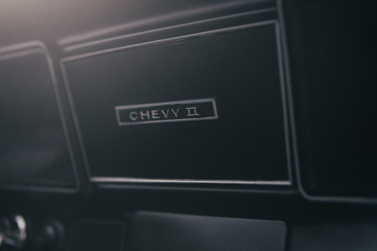 Chevy ii emblem on a car dashboard related to The Ultimate Guide to Chevy Short Bed Trucks