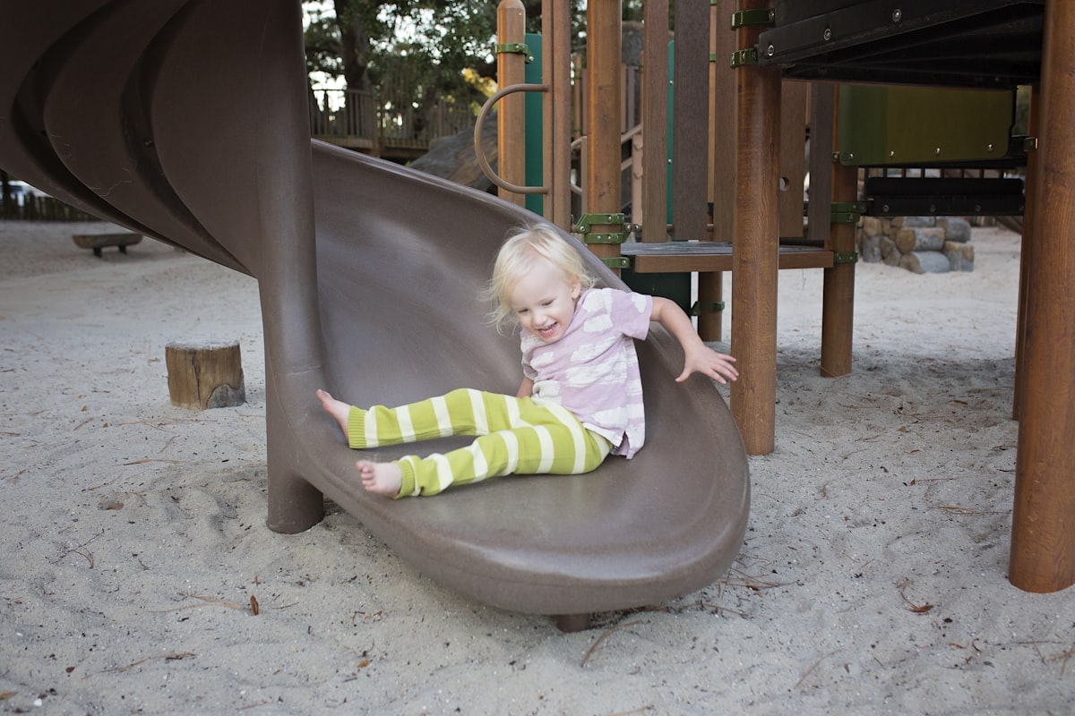Child on slide  related to The Ultimate Guide to Slide Beds for Toddlers
