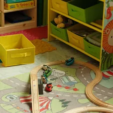 Children's playroom with toy train and storage related to Transform Your Child's Room with Disney Frozen Bedding