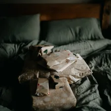 Christmas presents on a bed related to Transform Your Bedroom with The Nightmare Before Christmas Bedding
