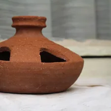 Clay chicken drinking bowl. related to The Ultimate Guide to Large Clay Chimineas