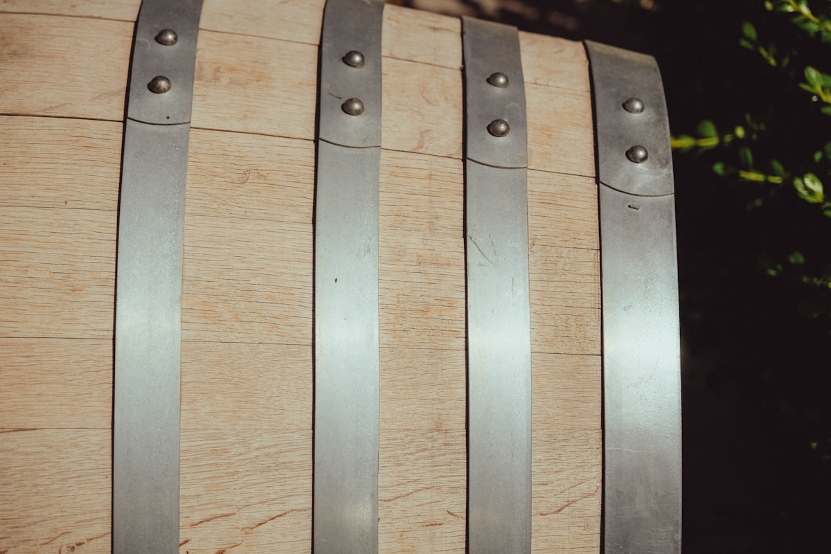 Close-up of a wooden barrel with metal bands related to Crate and Barrel Bed Frame: A Guide to Choosing the Perfect One