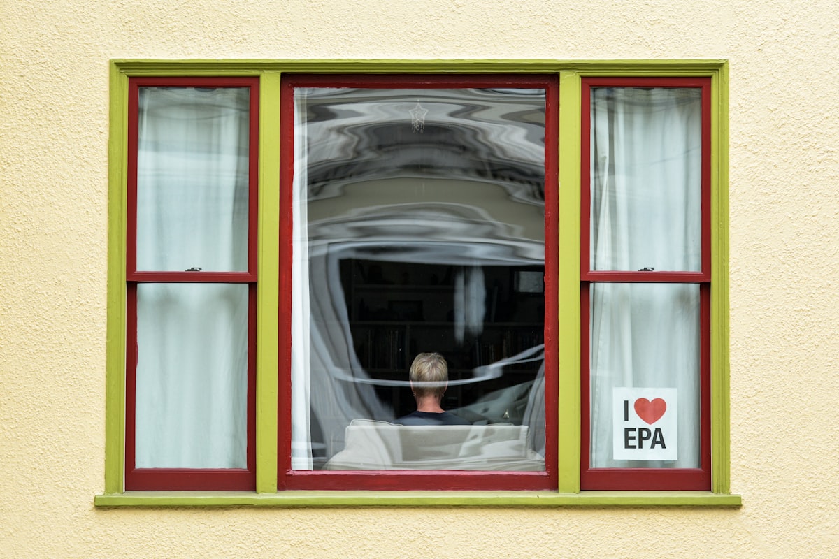 closed yellow and red window door related to Elevate Your Window Style: A Guide to Cornice Board Valances