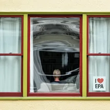 closed yellow and red window door related to Elevate Your Window Style: A Guide to Cornice Board Valances