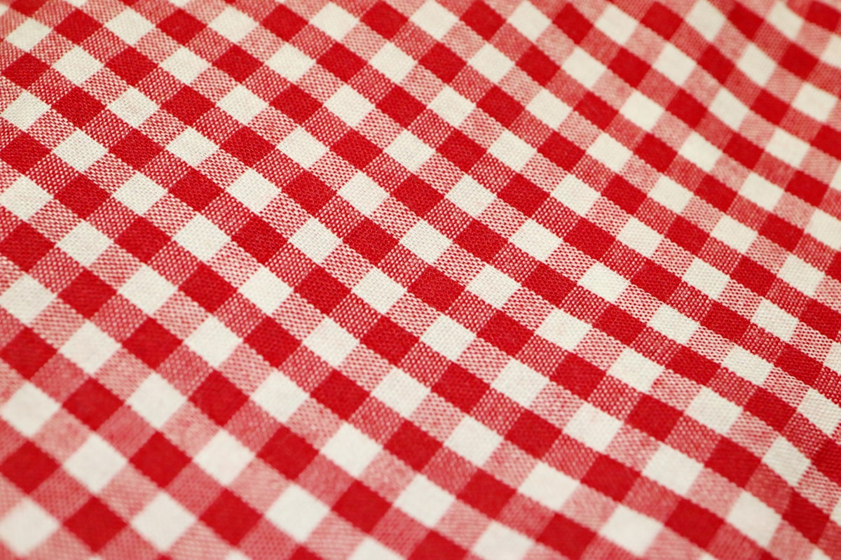 Closeup of cotton red and white gingham fabric. related to Red Gingham Valance