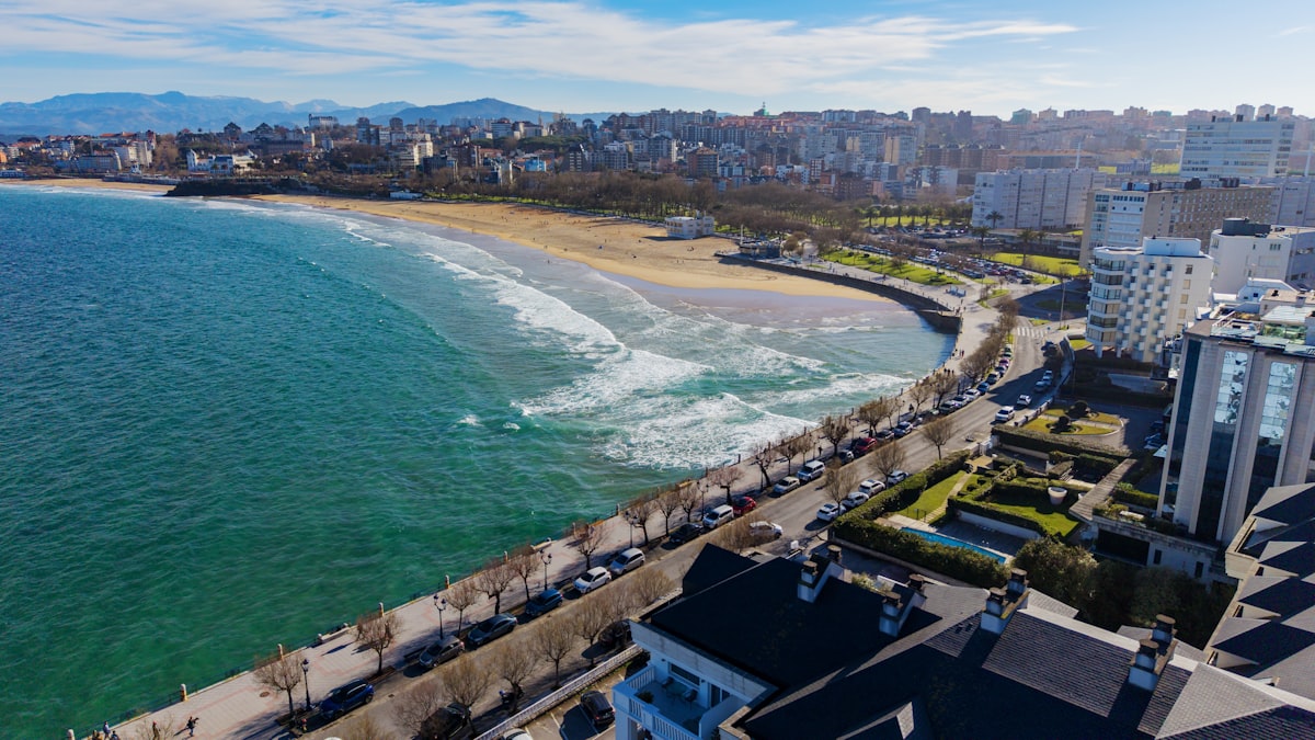 Coastal city skyline with a beach and ocean waves. related to Discover the Best Bed and Breakfasts in Ocean City, MD for Your Perfect Getaway