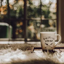 Coffee in early morning with sunshine related to Get Cozy: Where to Buy a Chiminea for Your Outdoor Oasis
