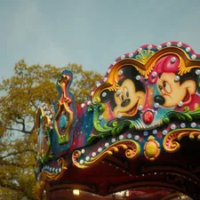 Colorful carousel with mickey and minnie mouse decorations related to Dreaming of Disney: The Ultimate Guide to Minnie Mouse Bed