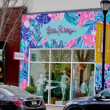 Colorful store facade with tropical floral print related to Elevate Your Bedroom with Lilly Pulitzer Bedding