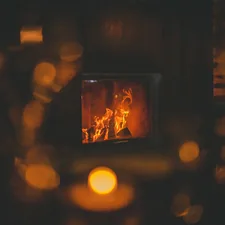 Cosy Fireplace in Chalet, warm Restaurant  related to Crackling Fires and Cozy Nights: The Ultimate Guide to Buying a Clay Chiminea