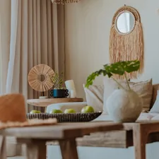 Cozy and modern living space with bohemian decor. related to Elevate Your Home Decor with Red Window Valances