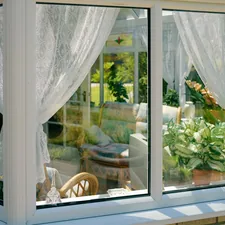 Cozy home living room related to Elevate Your Windows with Elegant Window Valances