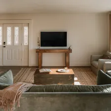 Cozy living room (IG: @clay.banks) related to Elevate Your Home's First Impression with a Rustic Entryway Table