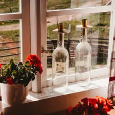 Cozy window sill in sweden related to Elevate Your Window Decor with a Navy Blue and White Valance