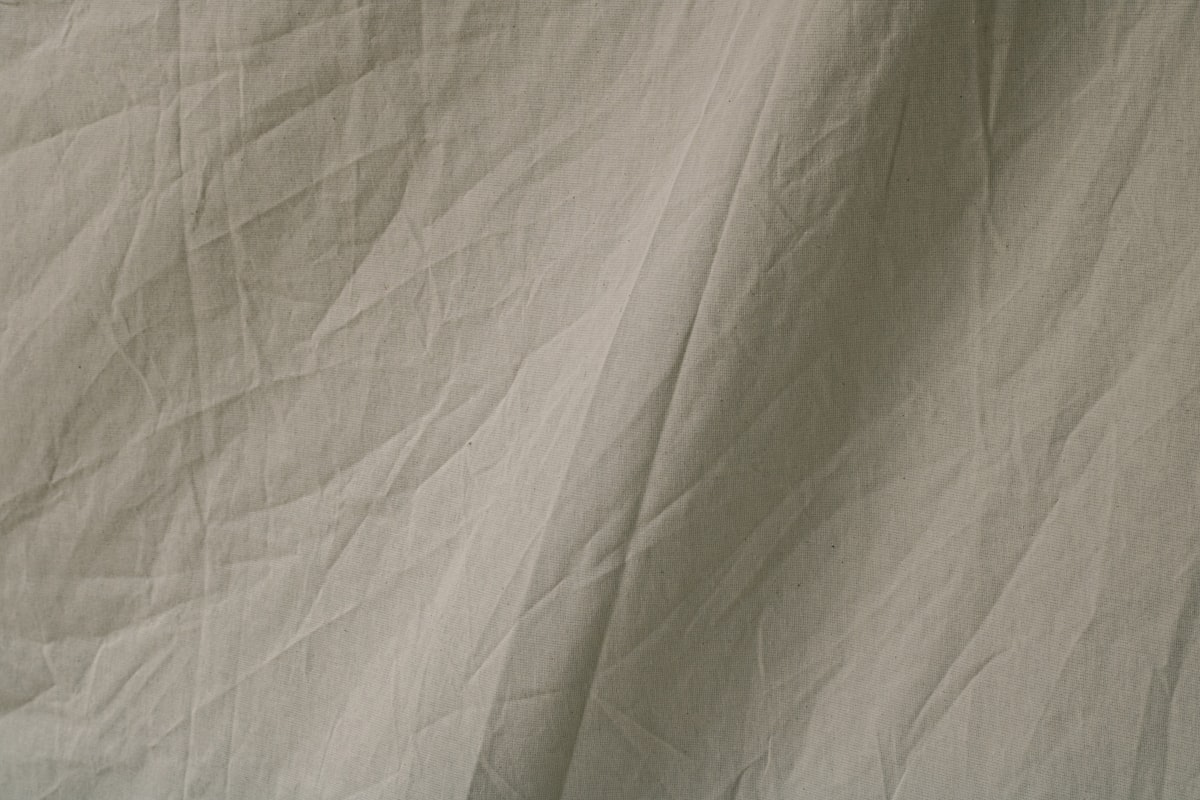 Creased textured fabric being used as a studio backdrop related to Grey Valance Sheet Double