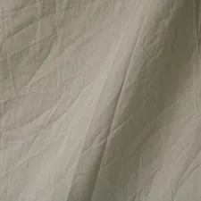 Creased textured fabric being used as a studio backdrop related to Grey Valance Sheet Double