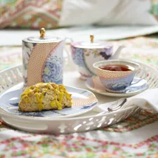 cup of tea and bread with dressing related to Discover the Charm of Cape May: A Bed and Breakfast Getaway