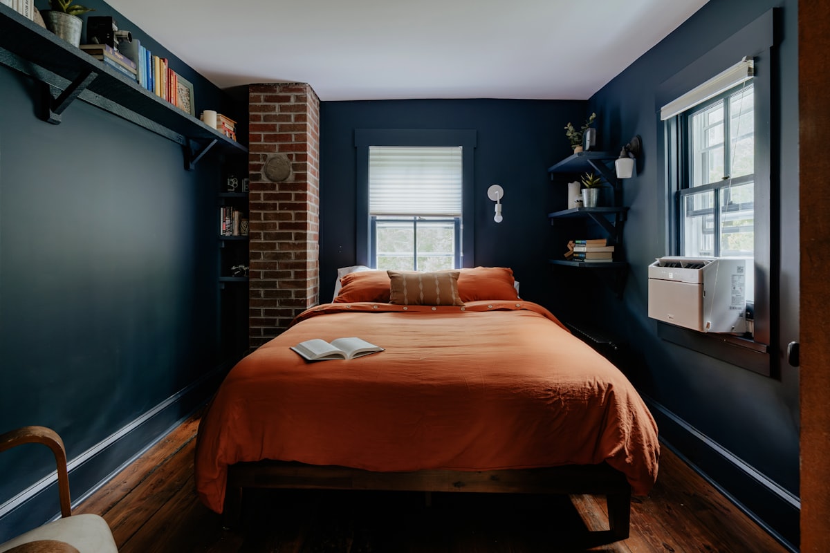 Dark bedroom (IG: @clay.banks) related to The Timeless Charm of Navy Blue Bedspreads and Coverlets: Elevate Your Bedroom Style