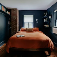 Dark bedroom (IG: @clay.banks) related to The Timeless Charm of Navy Blue Bedspreads and Coverlets: Elevate Your Bedroom Style