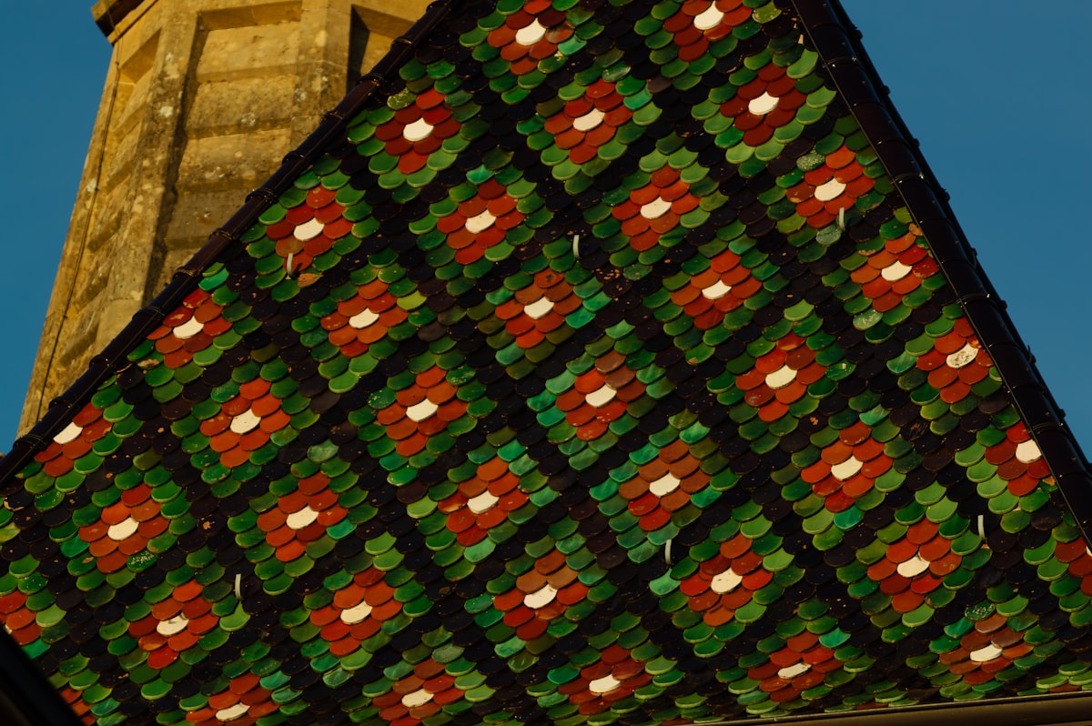 Detailed patterned roof tiles on a building related to Ultimate Guide to Minecraft Bedding