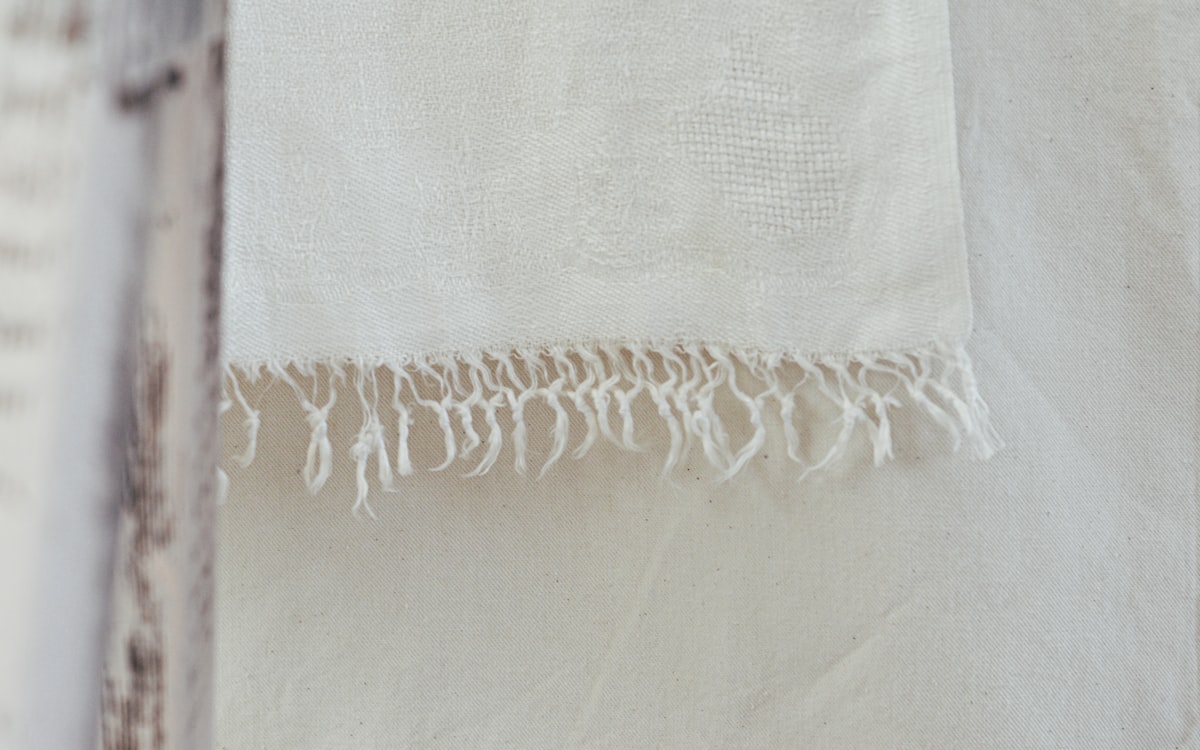 Details of fringe on vintage linen  related to Linen Window Valance: A Comprehensive Guide