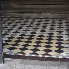 Diamond patterned tiles on a floor related to Timeless Elegance: Elevating Your Home with Slate Tile Entryway