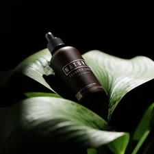 Dropper Bottle Mockups with Nature Theme, A dropper bottle mockups setup in a natural theme background. Download the PSD version of this dropper bottle mockup set for free from Mockup Free - https//mockupfree.net related to The Ultimate Guide to Tanning Bed Lotion Reviews