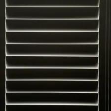 Early morning sun through shutters. related to Elevate Your Windows: Vertical Blind Valance Options