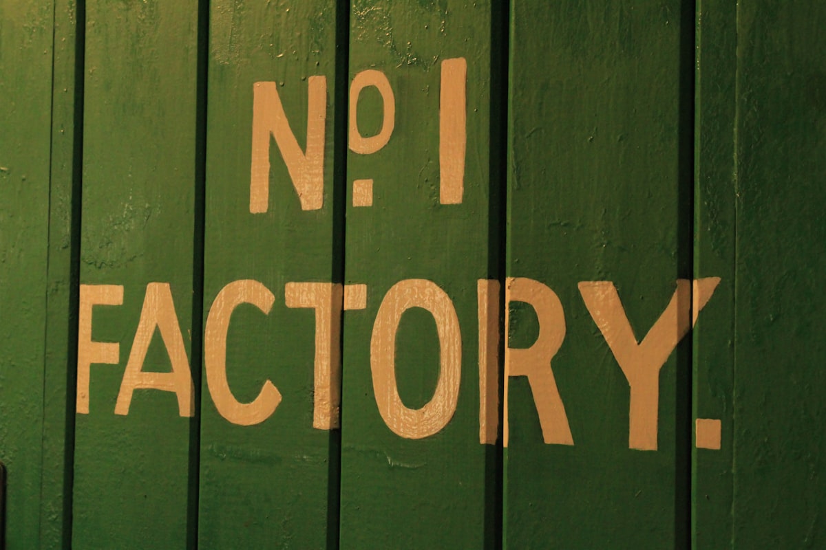 Factory sign in mill related to From Factory Floors to Cozy Canine Corner: The Dallas Manufacturing Company Creating Custom Dog Beds