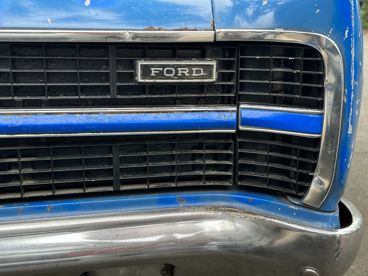Ford nameplate on a vintage American car related to Ford F150 Front Bumper Valance