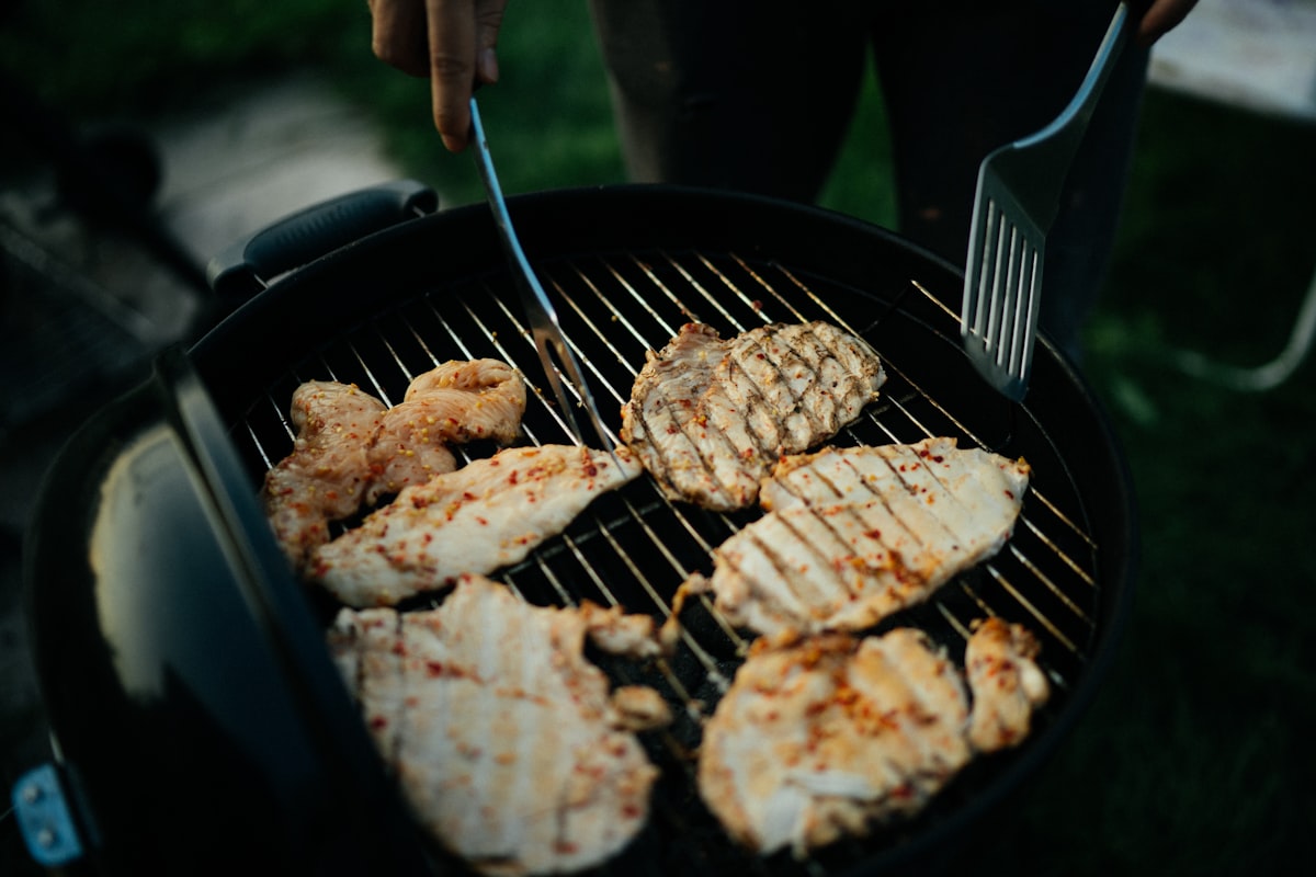 fried food on black pan related to Chiminea Cooking Accessories: Enhancing Your Outdoor Cooking Experience
