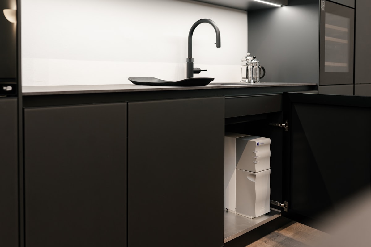 From your coffee machine to your dishwasher, Bluewater Spirit delivers a powerful flow of pure water to all of your kitchen appliances. Photo: Michael Holzinger related to Elevate Your Kitchen Style with a Sophisticated Black Kitchen Sideboard