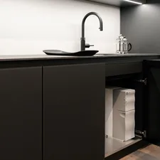 From your coffee machine to your dishwasher, Bluewater Spirit delivers a powerful flow of pure water to all of your kitchen appliances. Photo: Michael Holzinger related to Elevate Your Kitchen Style with a Sophisticated Black Kitchen Sideboard