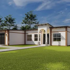 Front elevation of the lake house having entrance lobby and driveway to the garage. related to Dream Homes for Sale: 2 Bed 2 Bath Houses