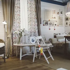 Furniture exposition in ikea salon - wicker chair, table, chair, curtains and so on. related to Cozy Country Interiors: Curtains, Valances, and Swags