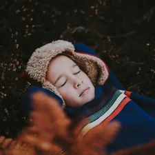 girl wearing blue jacket related to Cozy Dreams for Little Ones