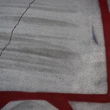 Graffiti art with red and blue elements on wall related to Thomas the Train Toddler Bed Set: A Fun and Cozy Sleeping Solution for Little Engineers