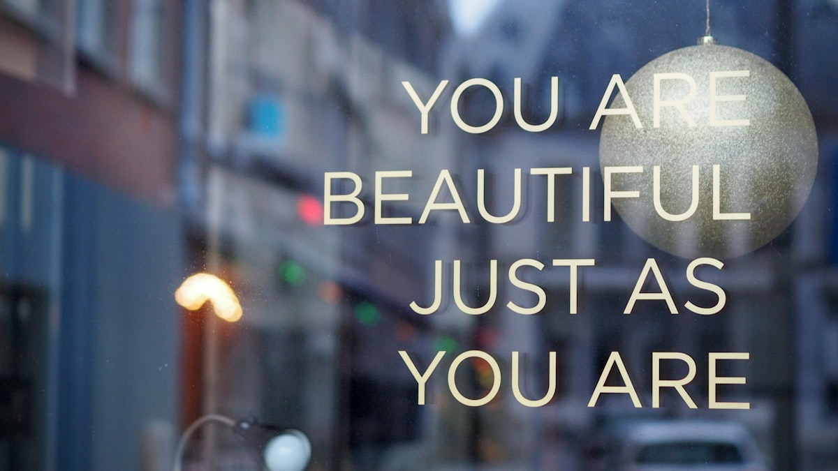 gray bauble with text overlay related to Elevate Your Windows: Inspiring Cornice Valance Ideas