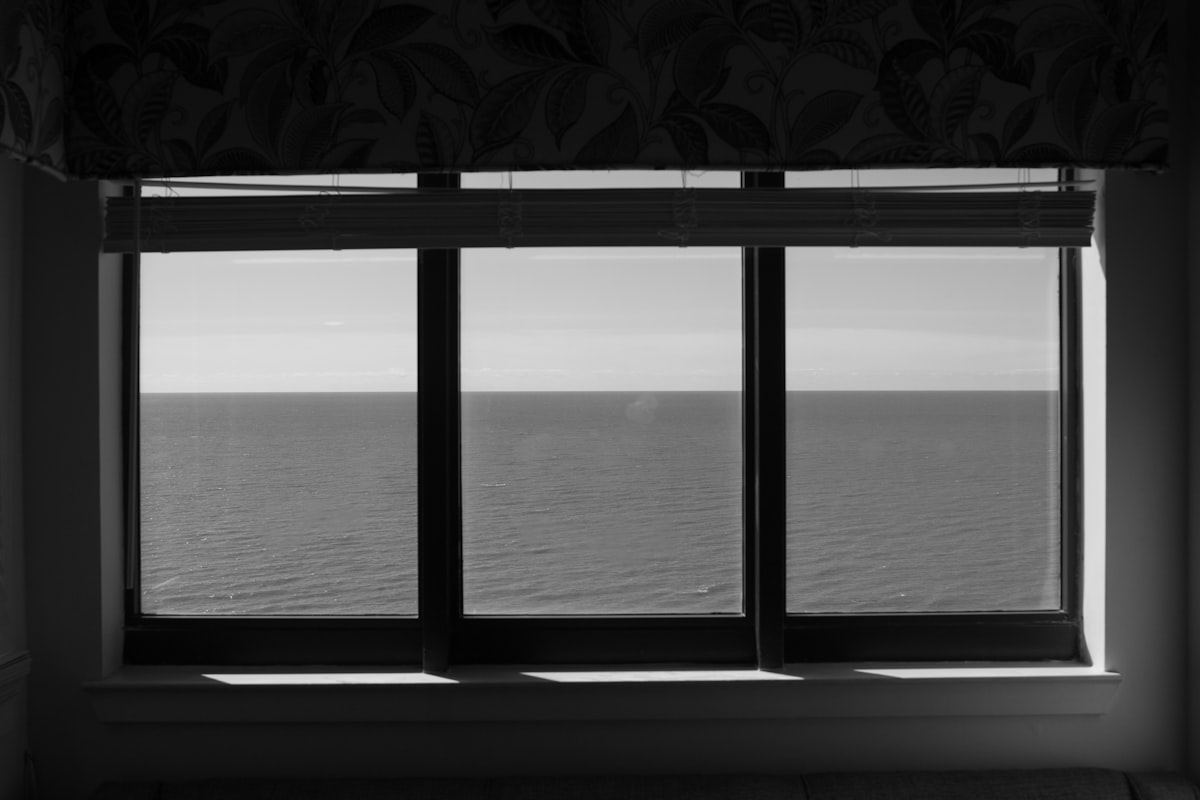 grayscale photo of a window related to No Sew Window Valances: A World of Elegance Without the Needle