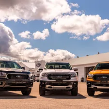 green and yellow chevrolet car on brown sand under blue and white sunny cloudy sky during related to Upgrading Your 2000 Ford F150: Front Bumper Valance Options