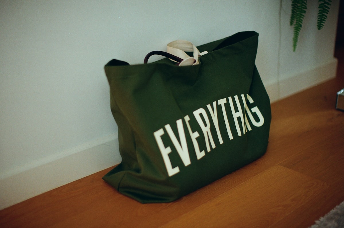 Green canvas bag with "everything" written on it. related to Finding the Best Deals on Bed in a Bag Queen Clearance