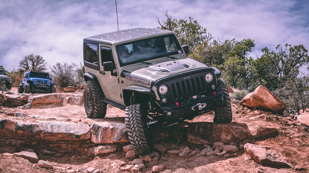 grey Jeep car related to Exploring the Jeep with a Truck Bed: A Unique Blend of Adventure and Utility