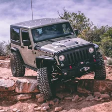grey Jeep car related to Exploring the Jeep with a Truck Bed: A Unique Blend of Adventure and Utility