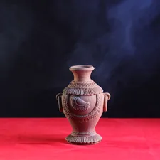 Handmade clay pot related to Warmth and Style: Discover the Best Small Clay Chimineas
