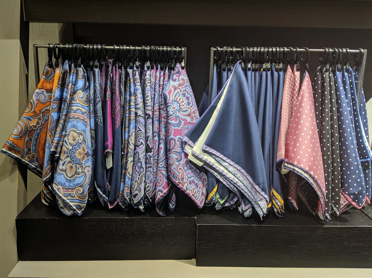 hanging assorted-color textile lot related to Hang On Fashion: Mastering Scarf Valance Installation