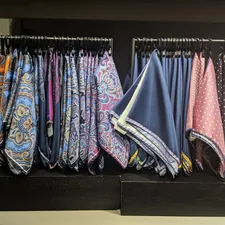 hanging assorted-color textile lot related to Hang On Fashion: Mastering Scarf Valance Installation